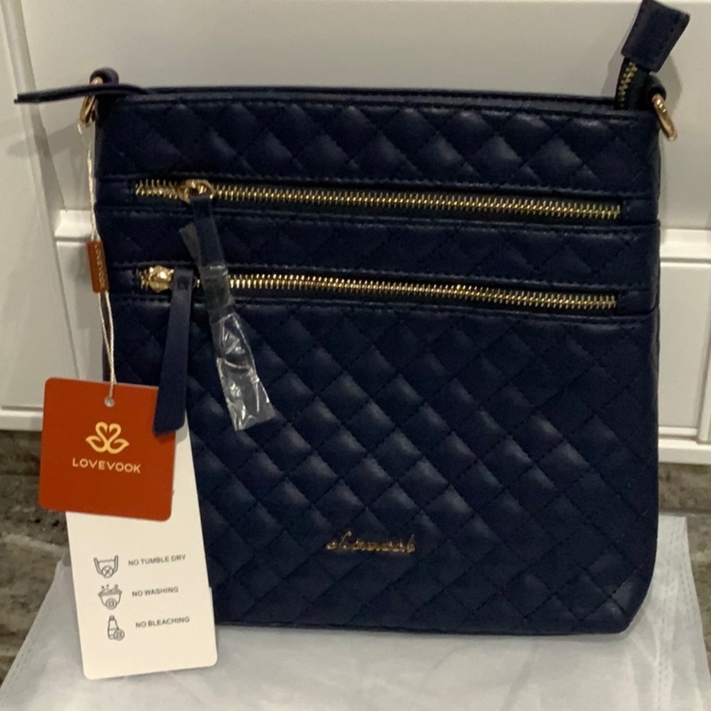 Elegant Blue Quilted Crossbody Bag with Gold Accents